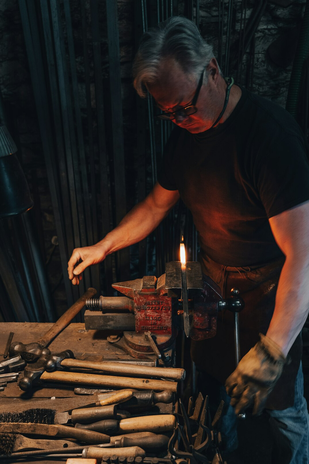 Polish craftsman working with his hands in a workshop