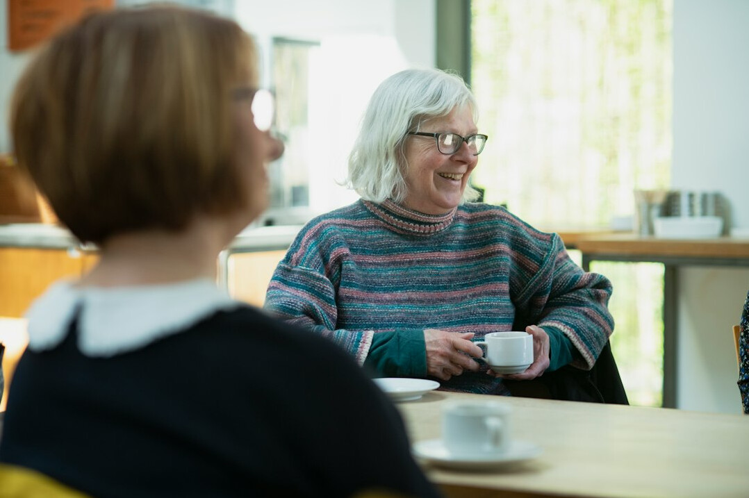 elderly woman telling story